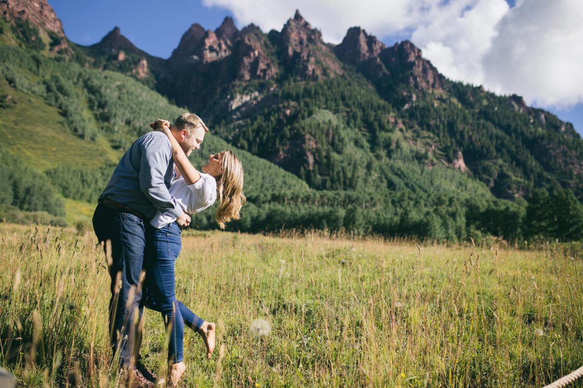 engagement session in field in aspen colorado