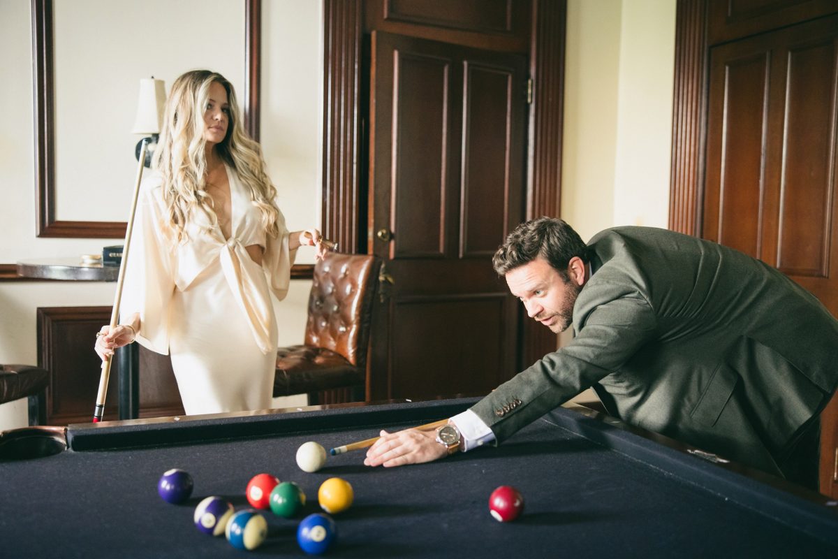 engagement photo with pool table