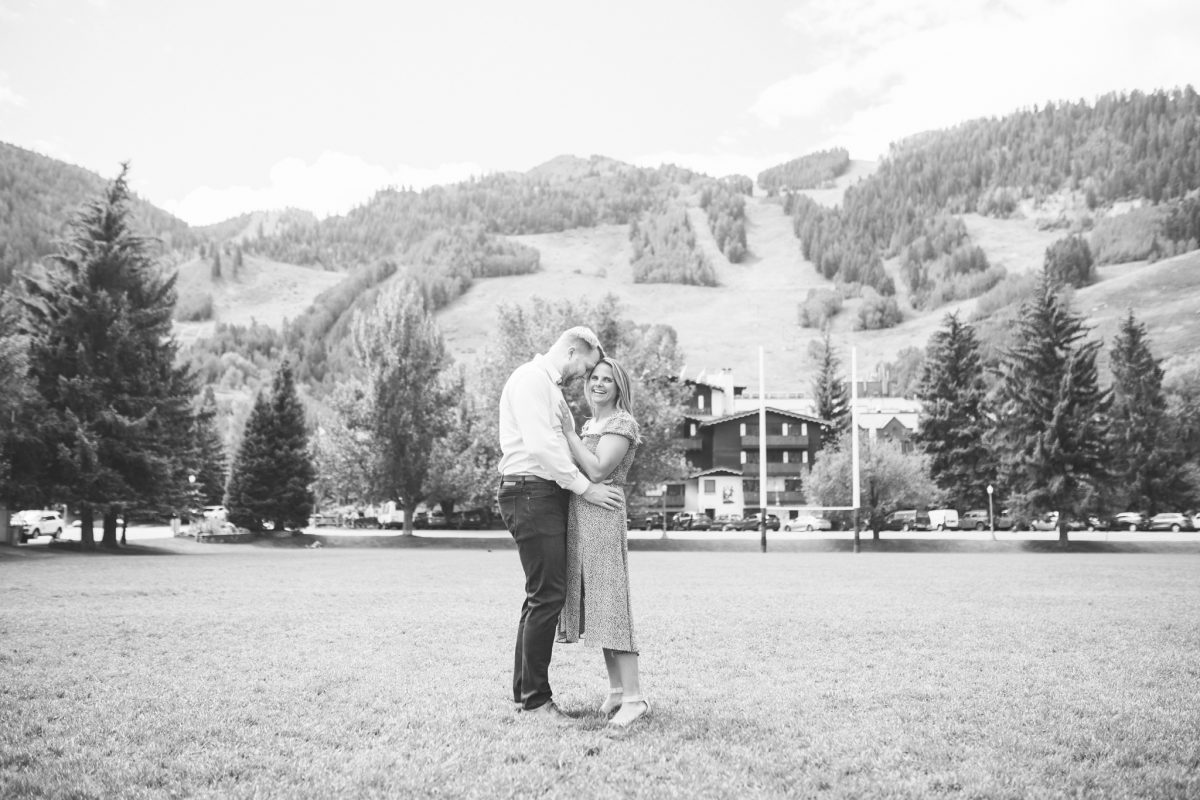 engagement session on field in aspen